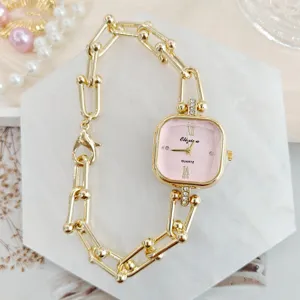 Elegante Damen Quarzuhr mit rosa quadratischem Zifferblatt und goldener Gliederkette.