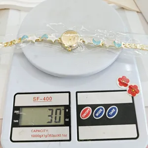 Star and moon design ladies watch bracelet with luxury style and 30g weight detail display.