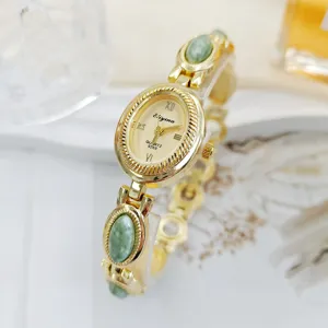 Vintage oval quartz watch for women with green stone bracelet, elegant wrist watch.