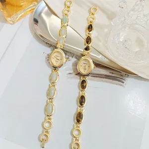 Exquisite vintage women quartz watch with tiger eye and green stone link bracelet, elegant design.