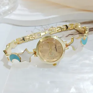 Elegant star moon women wristwatch with gold chain bracelet, chic quartz fashion watch.