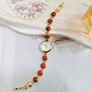 Elegante Quarzdamenuhr mit roten Steinverzierungen luxuriöses Mode Armbanduhr Design