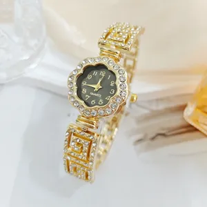 Luxury gold rhinestone quartz watch for women, flower dial fashion bracelet wristwatch accessory.