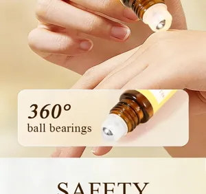 Flacon roll-on d'huile essentielle vue detail boule en metal, verre ambre application douce.