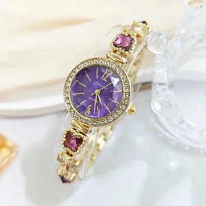 Luxury women quartz watch with purple dial, rhinestone bezel, and elegant clover bracelet.