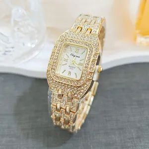 Luxurious gold square rhinestone women quartz watch with diamond bezel and stylish strap.