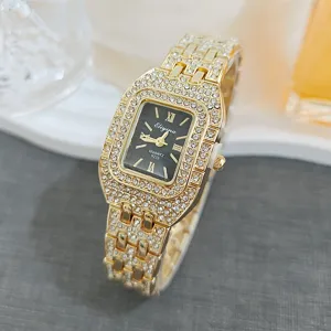Close-up detail of luxurious square rhinestone women quartz watch, sparkling crystal encrusted dial.