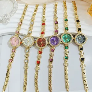 Elegant women quartz watch featuring clover chain strap and sparkling crystal bezel detail.