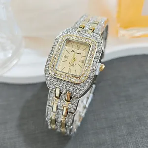 Detailed close-up of the luxury diamond-encrusted square quartz women watch, sparkling rhinestones.