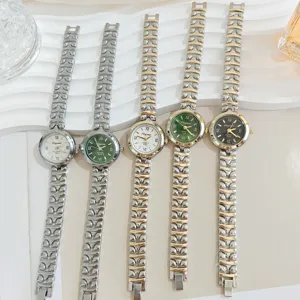 Detail shot of women's quartz watch with steel strap, Roman numerals, and multi-color dial options.
