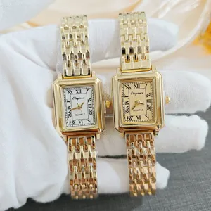 Detailed close-up view of elegant rectangular women watches with Roman numerals.