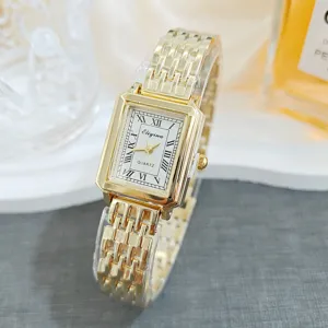 Elegant gold square women quartz watch with vintage roman numerals and metal bracelet link.