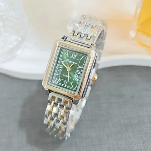 Elegant rectangular women quartz watch with green roman numeral dial and metallic strap.