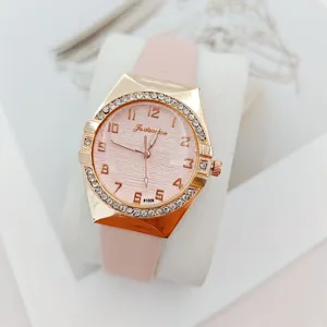 Elegant pink quartz women's watch with rhinestone bezel and rose gold case for daily wear.