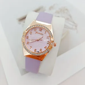 Close-up detail of the women quartz watch with purple leather strap and rhinestone bezel.