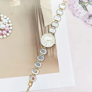 Elegante Damen Quarz Armbanduhr mit Kristall Armband, luxuriöse goldene Uhr für den Alltag.