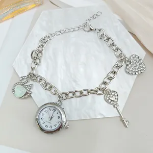 Zilverkleurige bedelarmbandhorloge met kristallen zwaan hart sleutel kwarts dames sieraden.