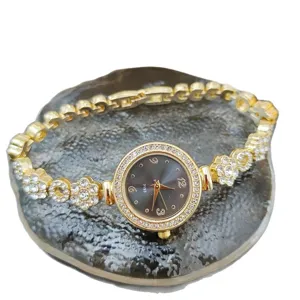Women quartz watch gold tone rhinestone flower bracelet watch elegant luxury style