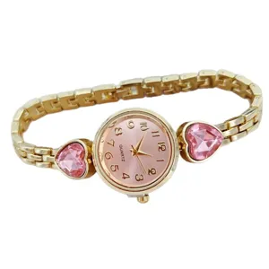 Elegant women quartz watch with pink heart crystal, gold metal strap and chic dial design.