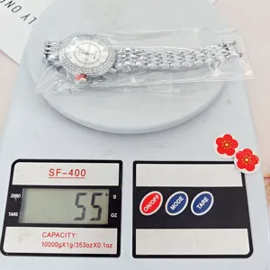 Damen Strass Quarz-Uhr mit Metallarmband und glitzernder Kristalllünette für Alltag und Geschenk