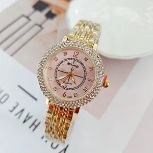Luxus Strass Damen Quarzuhr gold Metallarmband rosa Zifferblatt elegante Mode Armbanduhr
