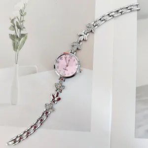 Damen Quarzuhr silbernes Metallarmband rosa Zifferblatt Strass Blumen Mode Armbanduhr