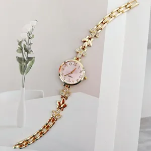 Elegante Damen Quarz Uhr goldenes Metall Armband Strass Blumen Zifferblatt Armbanduhr Chic.