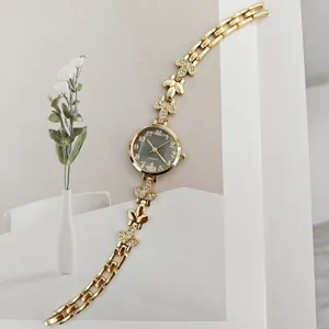 Elegante Damen Quarzwatch mit Strass Weizenblatt Armband und floralem Zifferblatt Design.