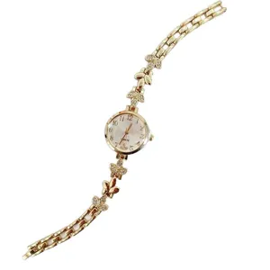 Elegante goldene Damen Quarzuhr mit Strass Weizenblatt Armband und klaren Zifferblatt Ziffern.