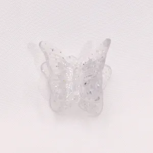 Mini butterfly hair claw clip for kids, transparent glitter design for cute daily hairstyles.
