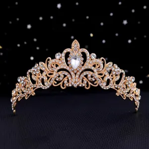 Exquisite gold rhinestone tiara, detailed view of sparkling crystal elements and alloy patterns.