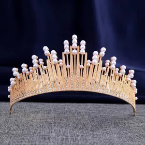 Gold pearl tiara detail view, exquisite rhinestones and elegant crown design for bridal wear.