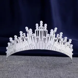 Silver pearl rhinestone crown hair accessory detail shot for wedding party dress up.