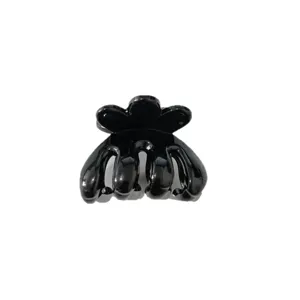 3cm black glossy plastic hair claw clip for women, compact mini hair styling accessory.