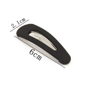Matte black snap hair clip detail, 6cm long, minimalist geometric design for daily styling.