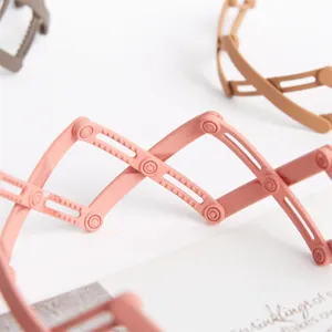 Minimalist expandable hair hoop for women, versatile folding bird nest hair accessory.