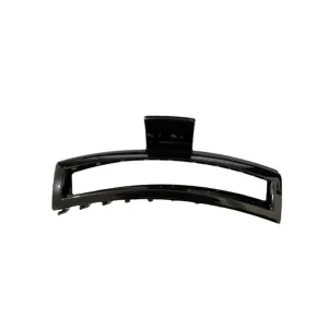 Large black glossy hair claw clip, geometric arch design, elegant thick hair styling accessory.