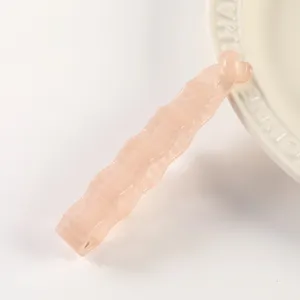 Pink translucent plastic banana hair clip, irregular jelly style minimalist tail clasp accessory.