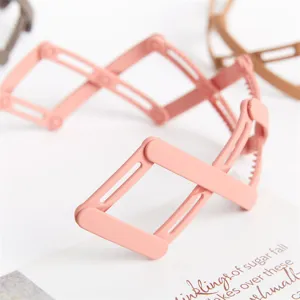 Minimalist pink expandable hair hoop, stylish folding bird nest headwear for daily wear.