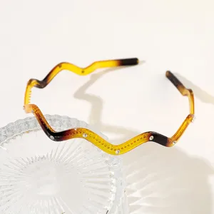 Tortoiseshell wavy rhinestone headband for women, elegant chic hair hoop for daily wear.