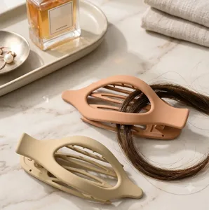 Minimalist oversized matte hair claw clip, elegant neutral tone hairpin for thick hair styling.