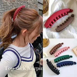 Minimalist hair clip detail view showing various colors and multi-angle styling presentation.