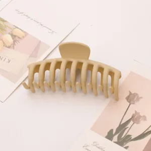 Minimalist matte plastic hair claw clip, solid beige tone, elegant and secure hold for daily.