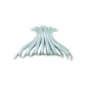 Eco-friendly ABS hair claw clip in light green, featuring a multi-tooth design for styling.