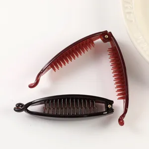 Detailed view of stylish banana hair clips, retro resin hair claws for elegant daily hair styling.