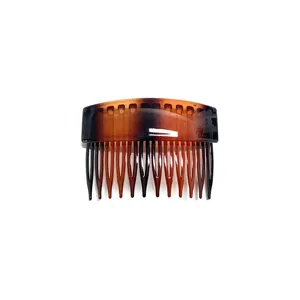 Tortoise shell hair comb insert stylish hair accessory for women styling detailed close up view