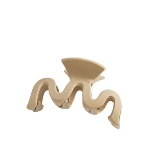 Minimalist beige plastic hair claw clip with stylish wavy design for elegant daily hairstyles.