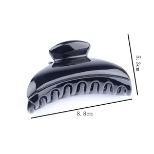 Black plastic hair claw clip large size sturdy grip styling accessory for women daily wear