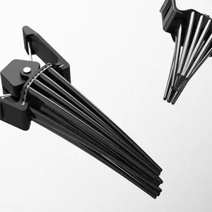 Black hair root volume clip for bang styling, simple and practical daily hair accessory.