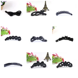 Korean style black plastic banana hair clips, stylish hair claws and hair accessories for daily wear.